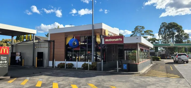 Repainted fast food restaurant drive-thru exterior