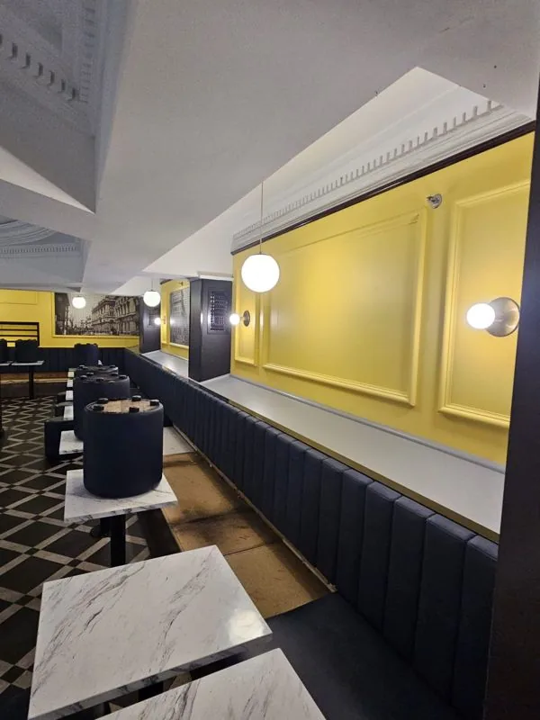 Hospitality venue interior repaint with painted panelling and feature walls